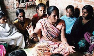 Group of women sitting in circle discussing healthcare